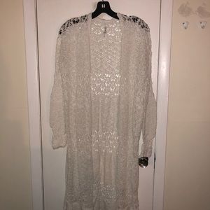 A white cardigan by Bethany Mota